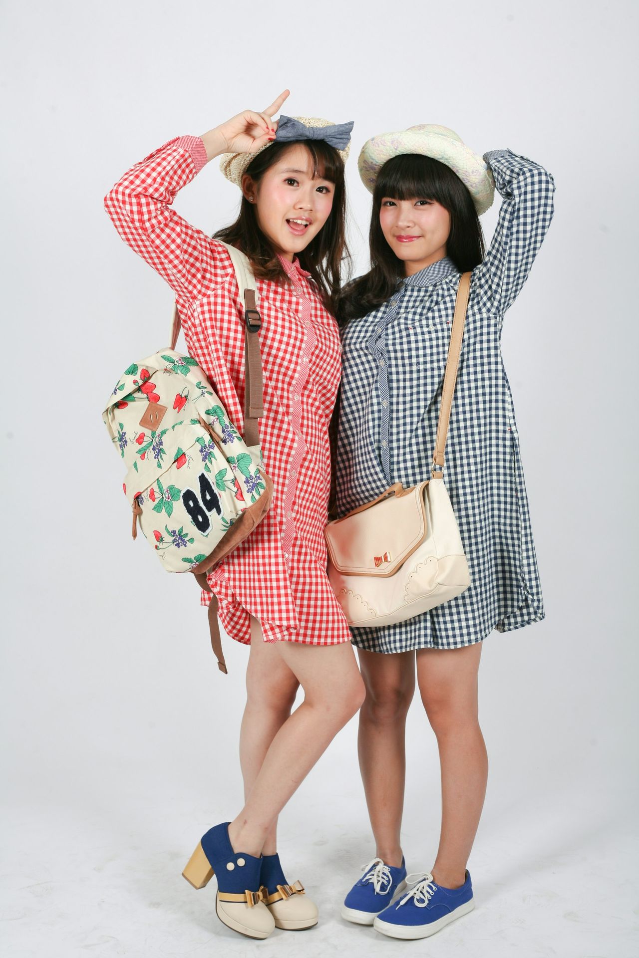 two young women posing for a picture together